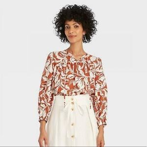 A. New Day - Rust floral long sleeve shirt